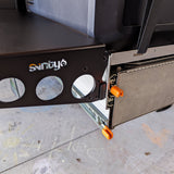 close up view of svnty offroad logo on patriot campers camping table