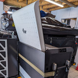 bungee around patriot campers side table with fridge open